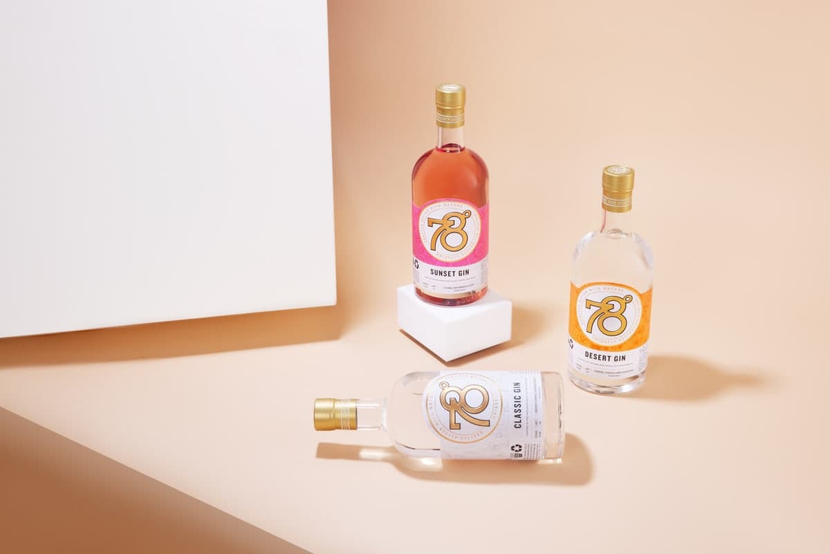 78 Degrees gin bottles styled together