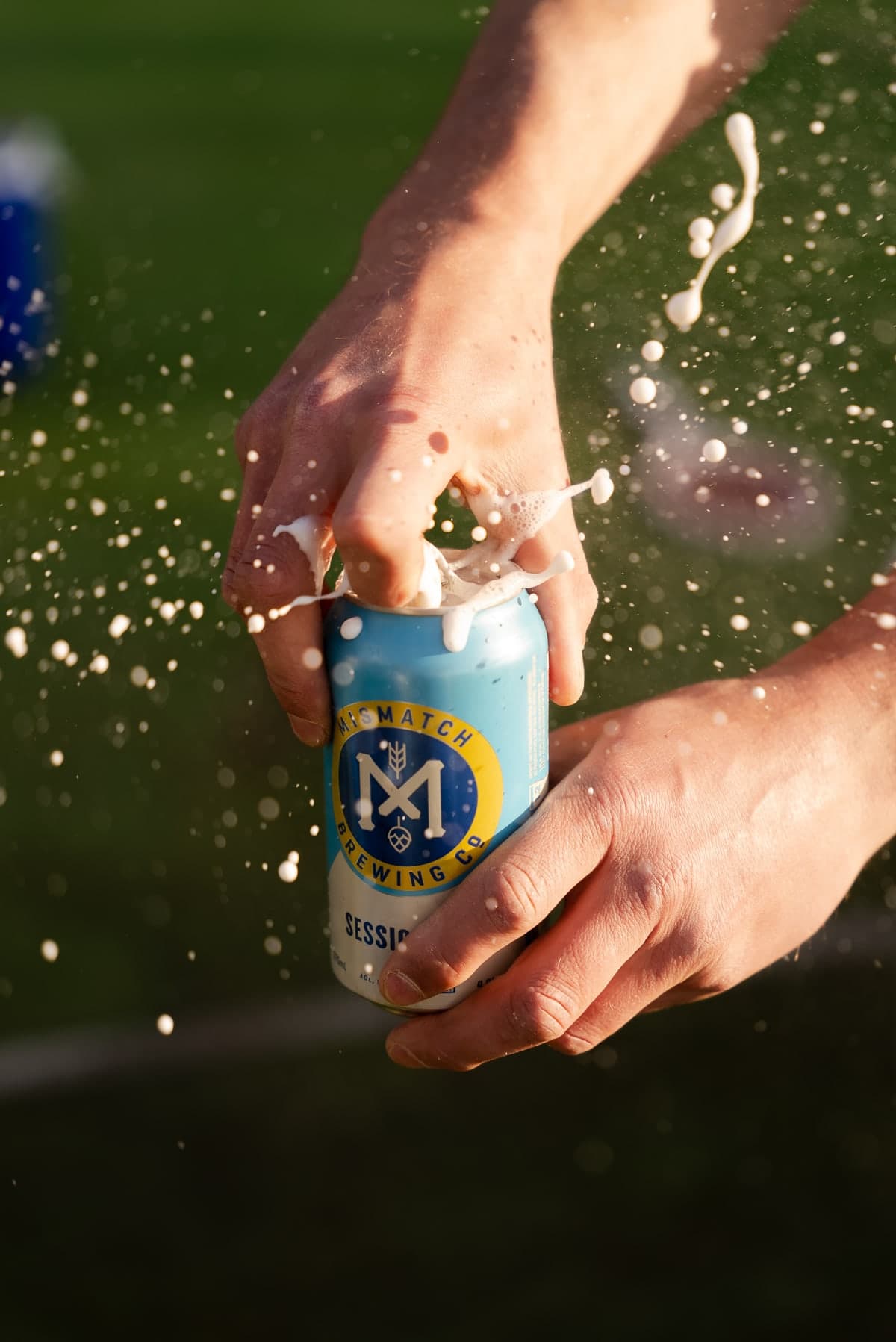 Mismatch Session can being opened, beer splash in golden light
